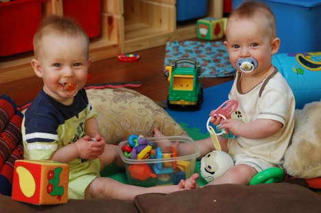 Two well rested twins, 8 months old